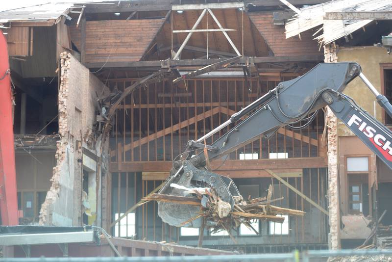 Workers from Fischer Excavating of Freeport demolish Congress School, 208 N. Congress Ave., on Tuesday, April 1, 2025 in Polo. Demolition of the 41,000 square foot school built in 1899, is expected to continue this week.