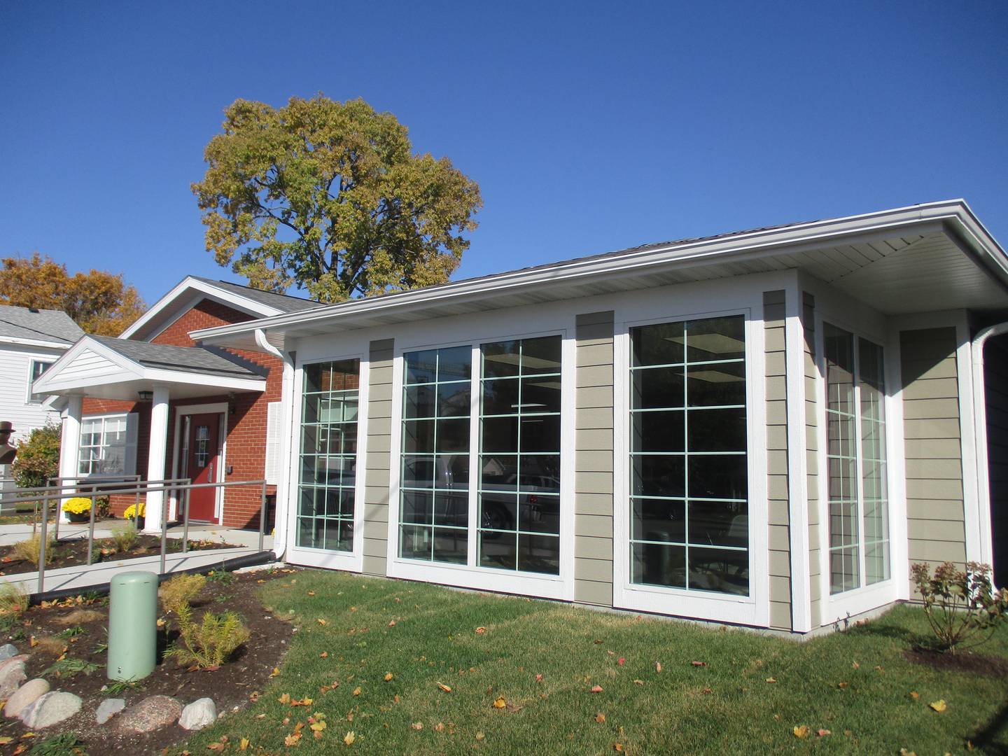 A sun room puts a new face on the Charles B. Phillips Public Library building in Newark. The library was showing off its $1.5 million expansion project with an open house on Oct. 22, 2022.