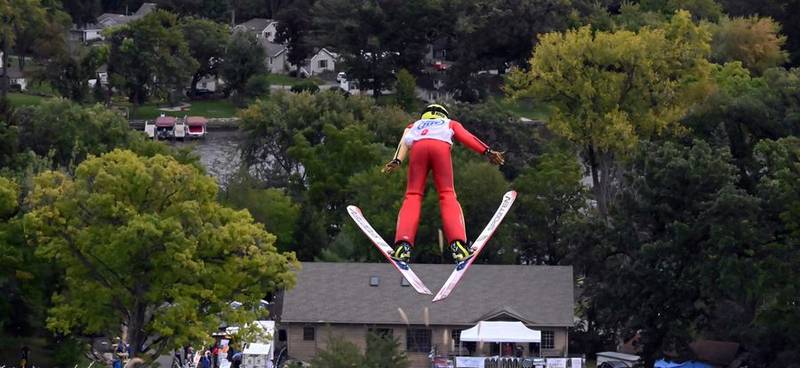 A ski jumper soars Sunday, Sept. 25, 2022, after taking off from the 70-meter hill Sunday during the Norge Ski Club's annual Fall Ski Jumping Competition in Fox River Grove.