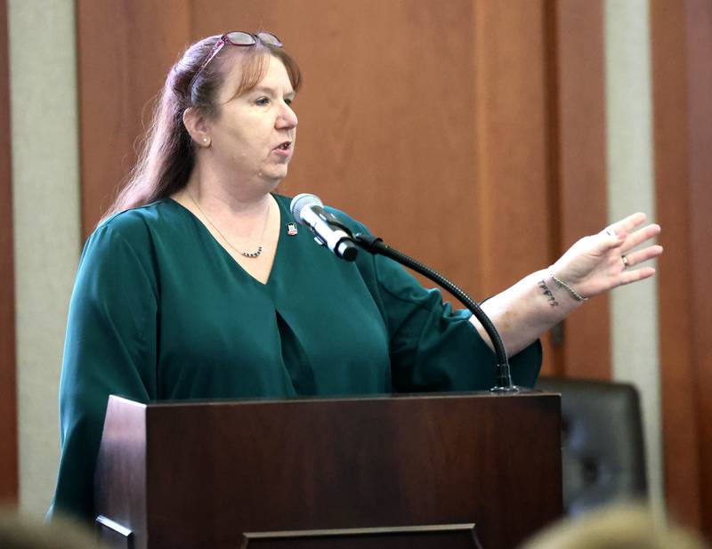 Rave Meyer, an office manager at Northern Illinois University and AFSCME Local 1890 president, speaks to the NIU Board of Trustees Thursday, June 12, 2025, during the meeting in Altgeld Hall at NIU in DeKalb. NIU clerical, professional and administrative workers represented by the American Federation of State, County and Municipal Employees Local 1890 are asking for higher wages when their contract expires at the end of the month.