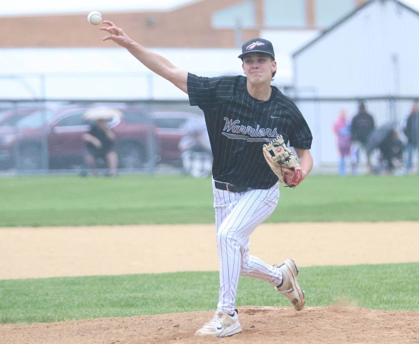Woodland/Flanagan-Cornell pitcher Nolan Price delivers home to a Henry-Senachwine batter Tuesday, May 12, 2026, at Woodland School in rural Streator.