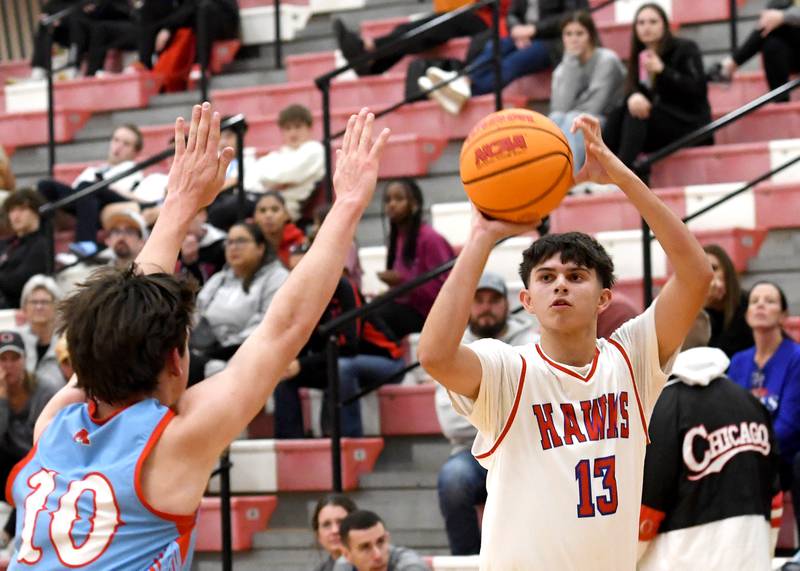 Oregon's Nole Campos shoots against Woodstock Marian at the Oregon Boys Basketball Thanksgiving Tournament on Wednesday, Nov. 26, 2025 at the Blackhawk Center in Oregon.