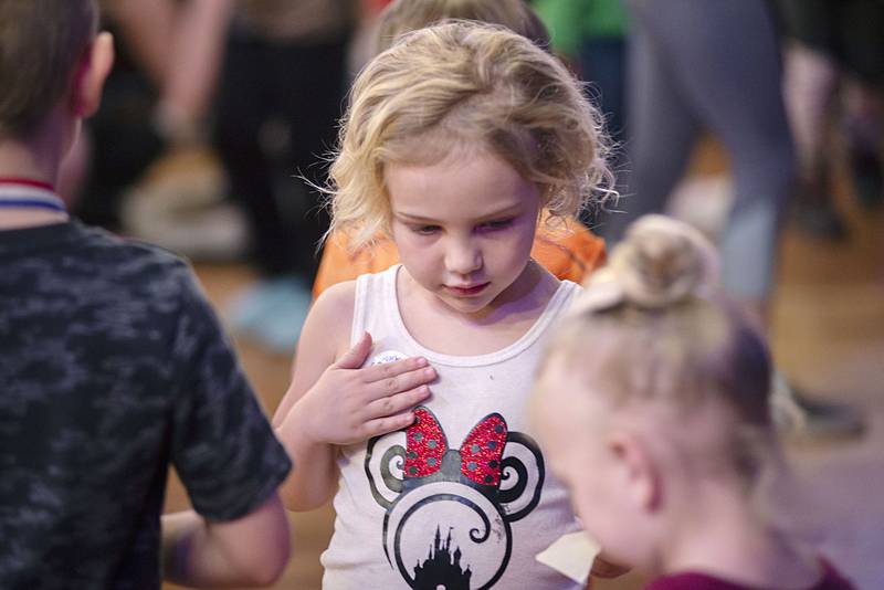 Raylynn Bausman, 3, of Rock Falls dons a new Hoo Haven sticker at the end of the Wednesday, April 13, 2022 program.