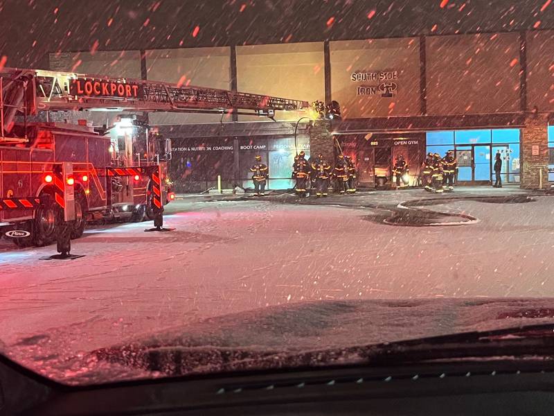 Lockport Fire Investigators is working to determine the cause of a fire on Friday night at a strip mall in the 900 block of East 9th Street in Lockport.