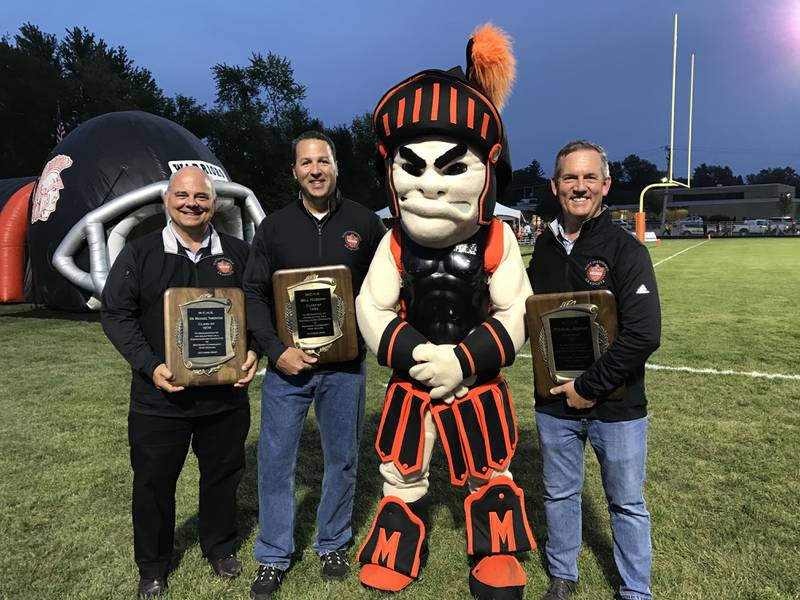 Bill Hobson and Robert A. Jessup were recognized during the October 1, 2021 McHenry High School homecoming game as Distinguished Graduates.