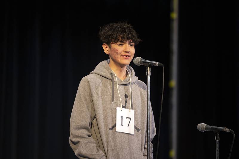 East Coloma-Nelson Elementary eight grader Bryce Johnson appears on stage Thursday, March 9, 2023 during the Lee-Ogle-Whiteside Regional Spelling Bee.