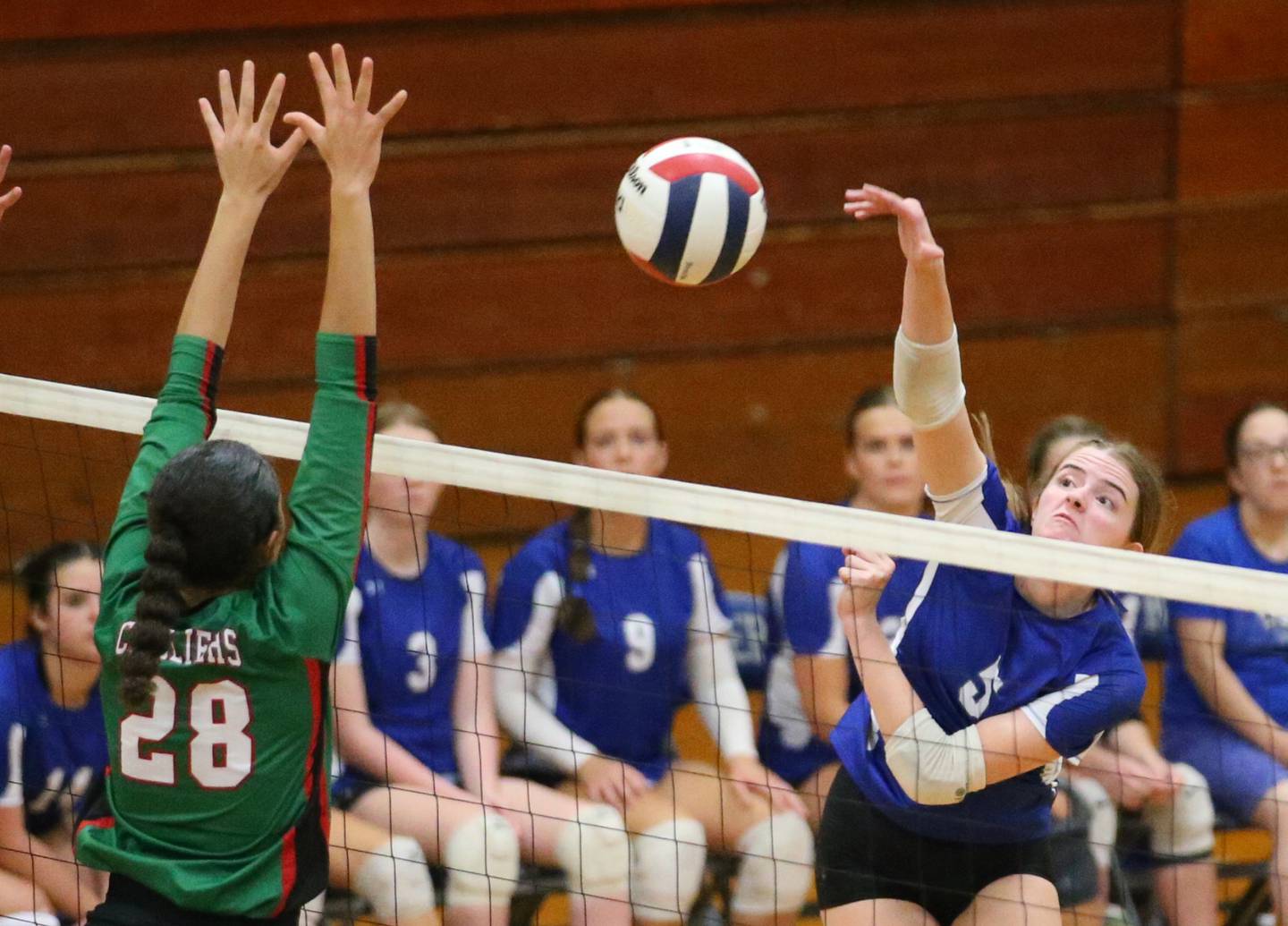 L-P's Karsyn Brucker spikes the ball past L-P's Ava Currie on Tuesday, Aug. 27, 2024 at Princeton High School.