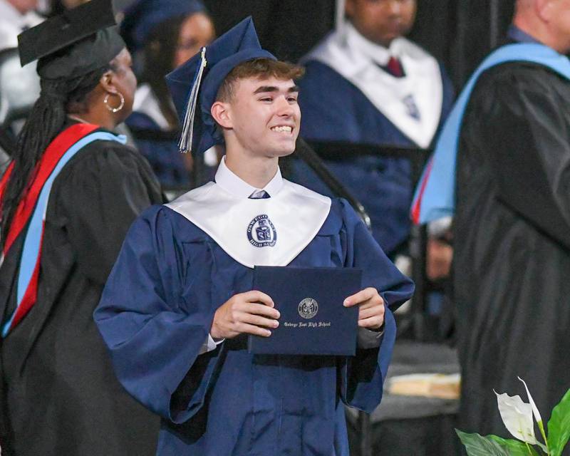An Oswego East graduate is all smile after receiving his diploma on Saturday May 17, 2025, during the graduation ceremony held at the Convocation Center in DeKalb.