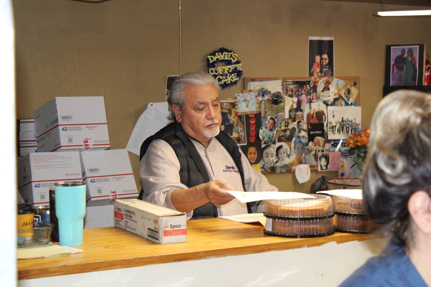 Dave Barajas Sr. is at the front counter of Dave's Coffee Cakes in Rock Falls.