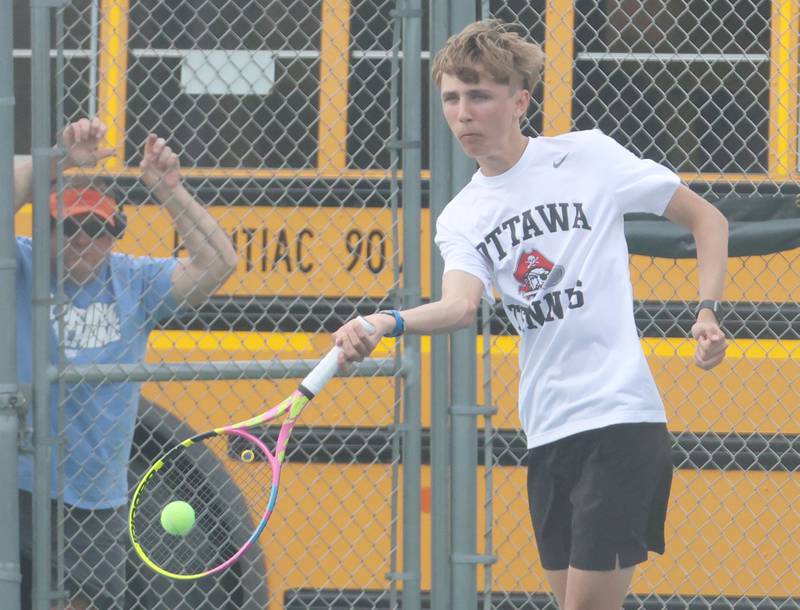 Ottawa's Hendrix Link returns a serve on Tuesday, April 21, 2026 in the Henderson-Guenther Tennis Facility at Ottawa High School.