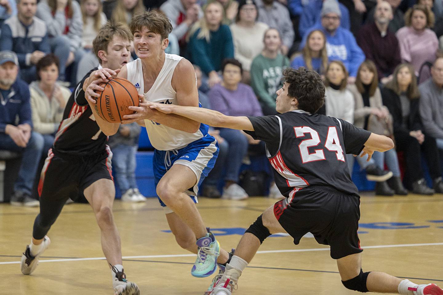 Faith Christian’s Isaiah Schuler drives to the hoop Thursday, Dec. 15, 2022 while playing Rockford Fire.