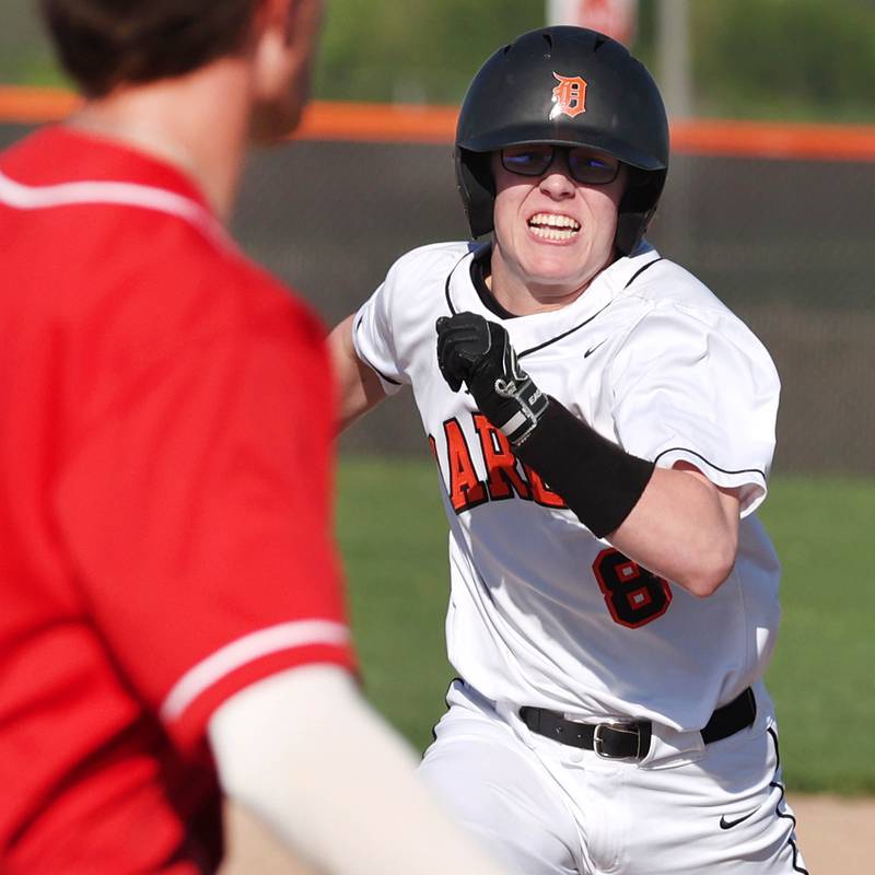 DeKalb's Connor McPartlin runs to third on his way to scoring a run during their game against Naperville Central Tuesday, April 30, 2024, at DeKalb High School.