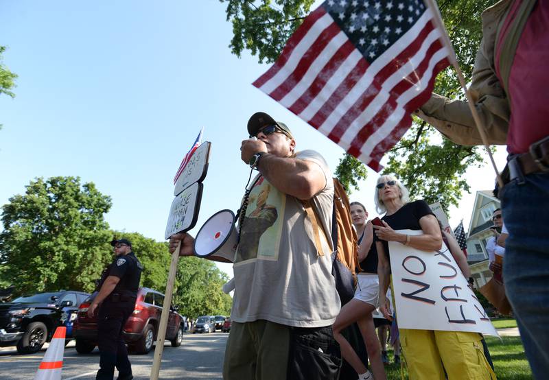 People including Veteran and Firefighter John Martinez of Chicago participates in the nationwide No Kings Day Rally held in LaGrange Saturday June 14, 2025.