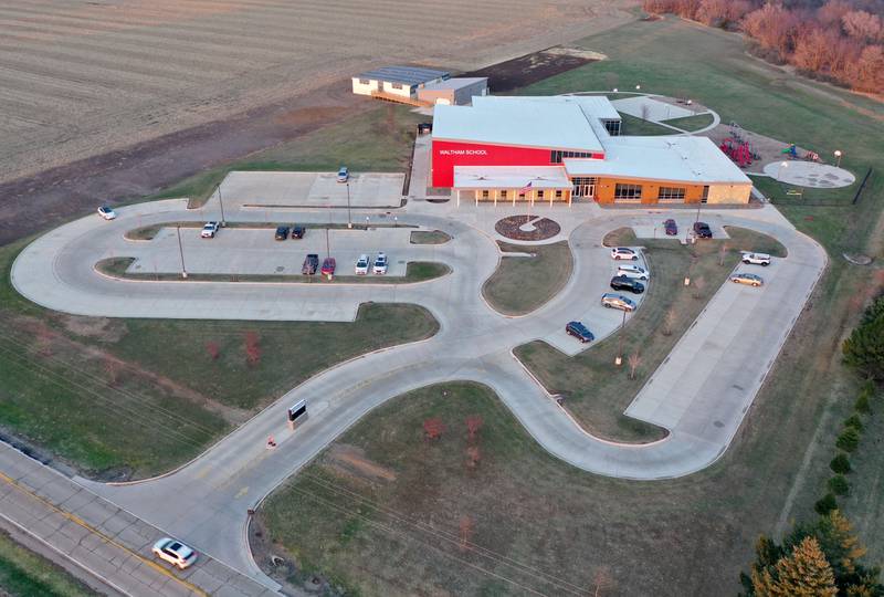 An aerial view of Waltham School on Thursday, March 27, 2025 in Utica. The area where the mobile classrooms are is the proposed expansion for the school if the referendum passes on Election day.