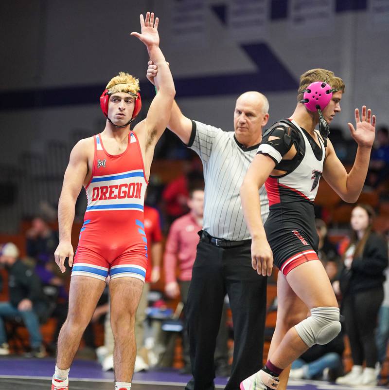 Oregon’s Anthony Bauer wins his 165 pound championship match against Gibson City-Melvin Sibley’s Cooper Miller during the Reaper Classic Wrestling meet at Plano High School on Saturday, Dec 9, 2023.