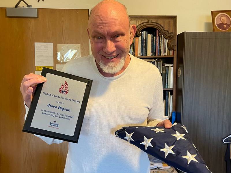 DeKalb area historian Steve Bigolin poses with his award after he was one of four people recognized by Boy Scout Troop 33 with the DeKalb County Tribute to Heroes award in 2025.