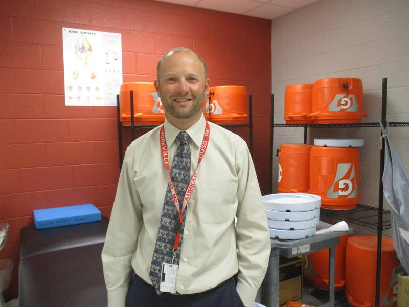 Yorkville High School Associate Principal Luke Engelhardt is seen here in the school's sports training room on May 22, 2023.