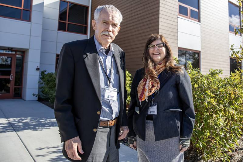 Former Stepping Stones executive director Paul Lauridsen and the new Stepping Stones executive director Rabbi Jenny Steinberg-Martinez take a photo outside the organization’s new Women and Children Recovery Home on Oct. 30, 2025.