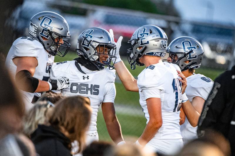 Oswego East's Brandon Solis celebrates his touchdown during a game against Plainfield North on Friday Sept. 12, 2025 at Plainfield North High School in Plainfield