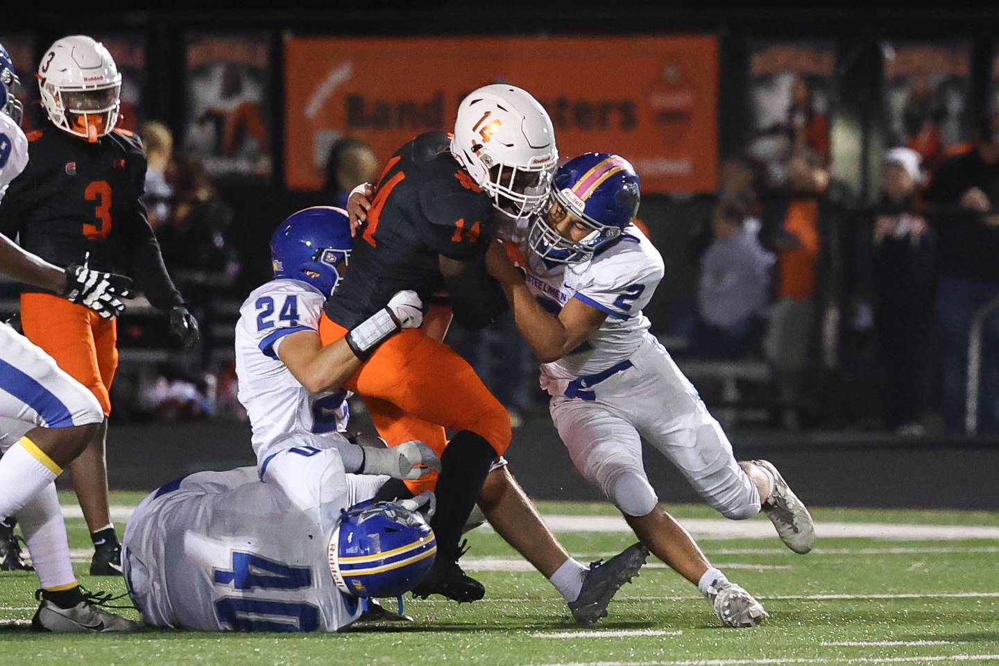 Plainfield East’s Shawn Harris powers his way forward against Joliet Central on Oct. 4, 20234 in Plainfield.