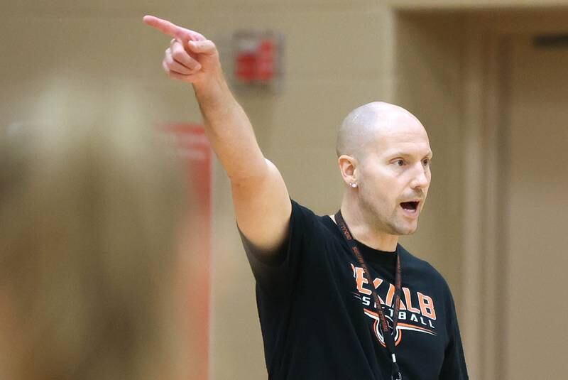 New DeKalb girls basketball head coach Bradley Bjelk talks to his team Thursday, June 23, 2022, at girls basketball practice at DeKalb High School.