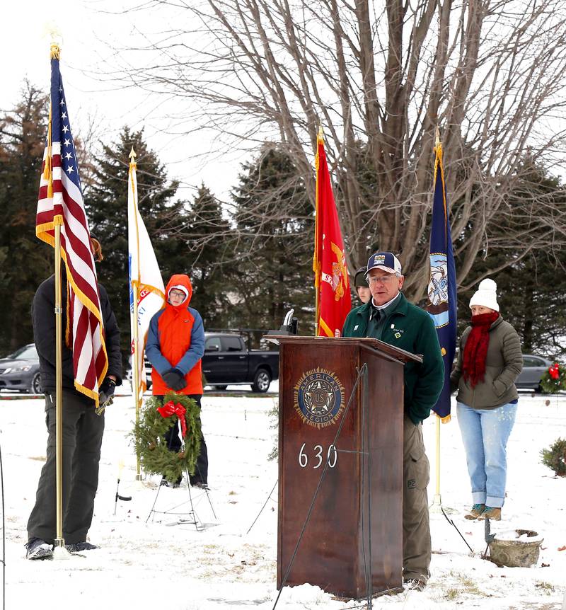 Charter Organization Representative/Committee Chair for Venturing Crew 413, Bruce Aderman, speaks at St. Gall’s Cemetery in Elburn on Saturday, Dec. 17, 2022.