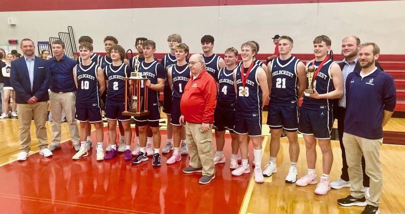 The Fieldcrest Knights defeated L-P 48-38 Saturday night at Hall High School to repeat as Colmone Classic champions. They are joined by tournament founder and namesake Frank Colmone.