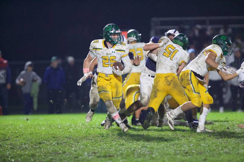 Crystal Lake South's Jake Christensen runs for a gain against Cary - Grove on Friday, Oct. 13 2023 in Cary Grove.