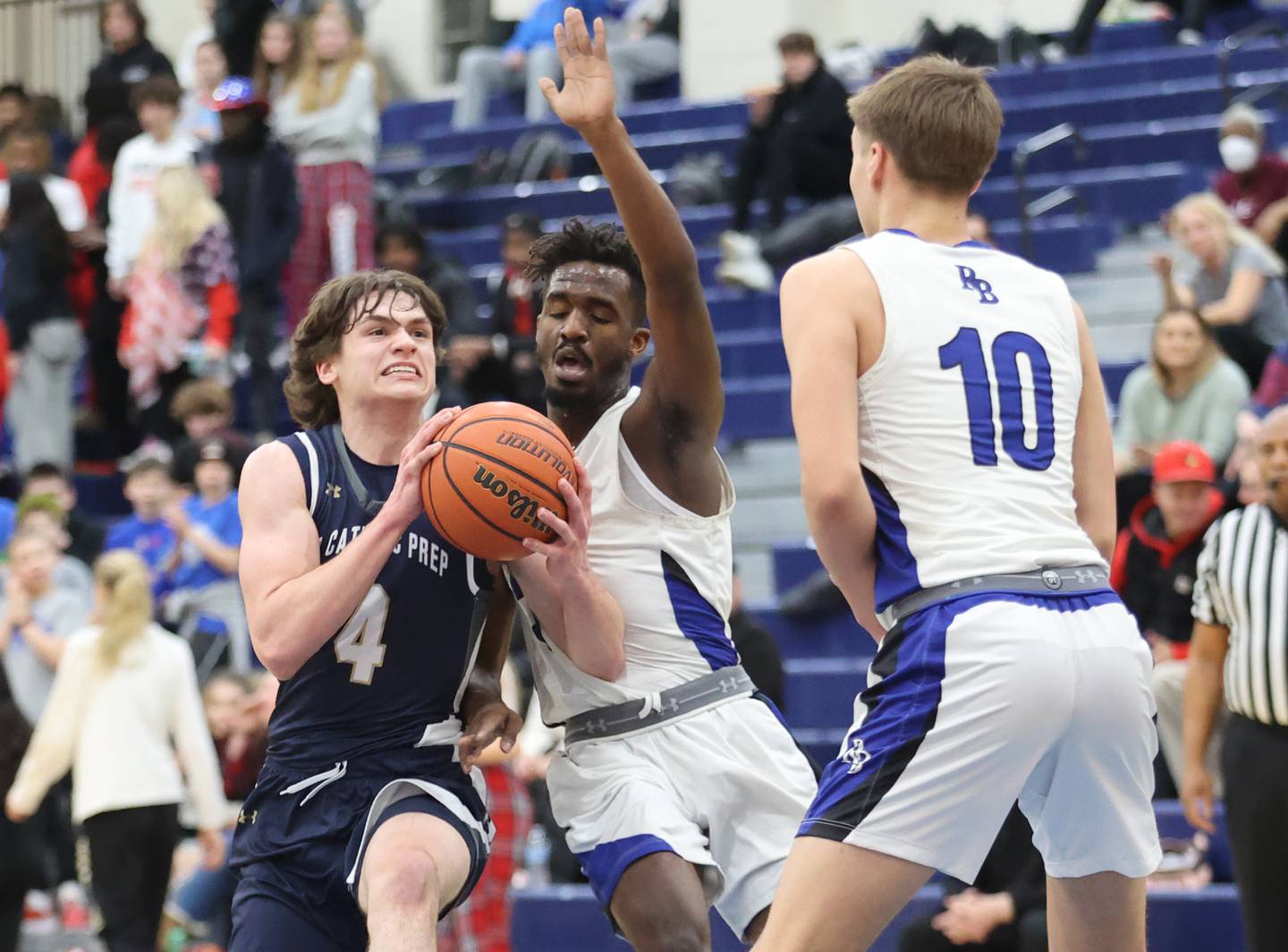 ICCP's Dean O'Brien (4) drives to the basket during the boys varsity basketball game between IC Catholic Prep and Riverside Brookfield in Riverside on Tuesday, Jan. 24, 2023.