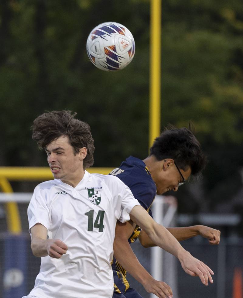 Geneseo’s Cedric Kehoe and Sterling’s Kevin Ruiz go up to play the. Ball Tuesday, October. 1, 2024, at Sterling High School.