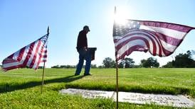 Volunteers needed to place flags on graves of veterans