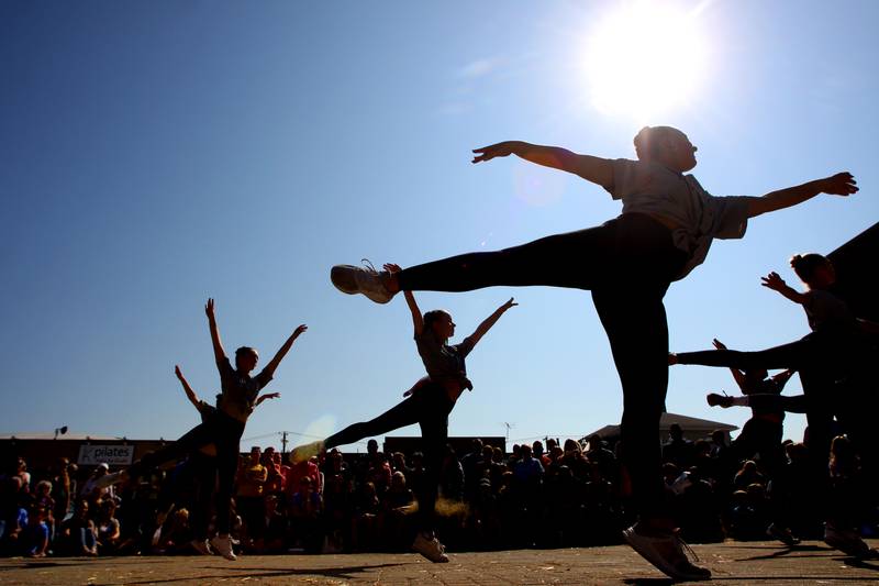 The Engage Dance Academy Competition Team performs during the Johnny Appleseed Festival in Crystal Lake Saturday.