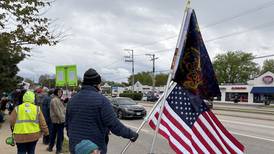 Protesters gather in McHenry for May Day rally