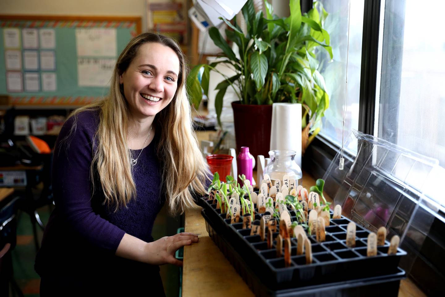 Anna Pagdin, a fifth grade teacher at Sacred Heart School in Lombard, has helped start a student garden at the school.