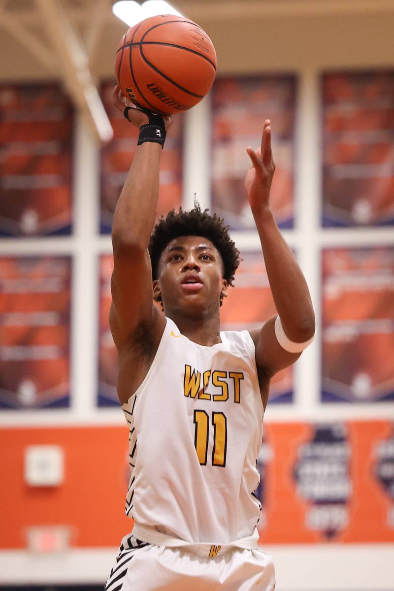 Joliet West’s Jeremy Fears takes the open jump shot against Romeoville on Tuesday January 31st, 2023.
