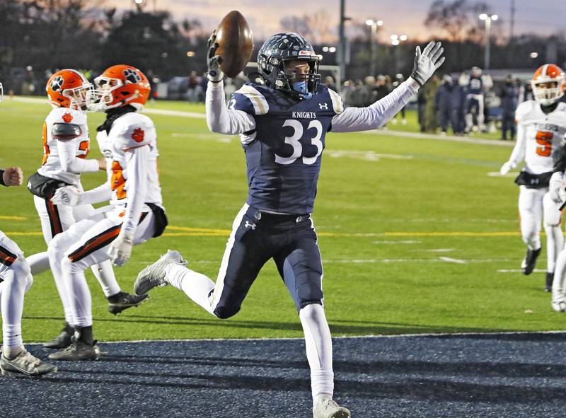 IC Catholic's Joey Gilatta (33) crosses the goal line for a touchdown during the Class 3A varsity football semi-final playoff game between Byron High School and IC Catholic Prep on Saturday, Nov. 19, 2022 in Elmhurst, IL.