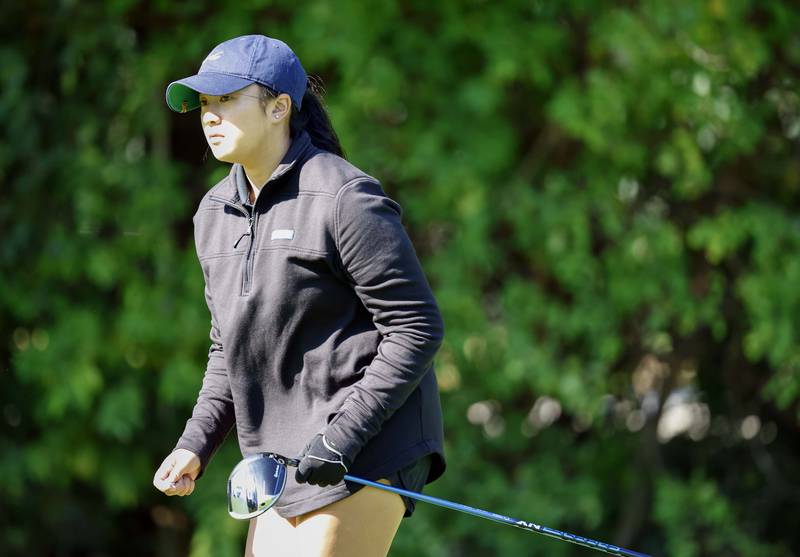 Angel Nguyen of Glenbard North, reacts to her drive during the IHSA Class 2A West Chicago girls golf regional at St. Andrews Tuesday, Oct. 1, 2024 in West Chicago.