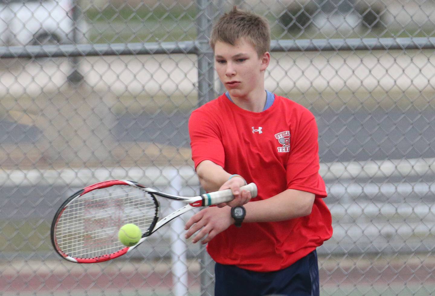 Streator's Brad Minick plays tennis at the L-P Athletic Complex on Monday, April 3, 2023 in La Salle.