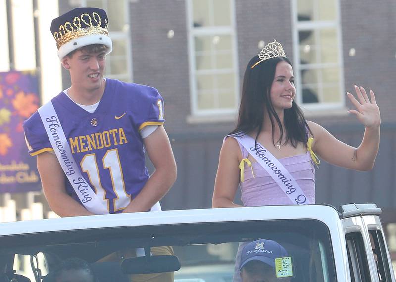 Mendota High School homecoming king Aden Tillman and queen Addy Aliensworth ride down Indiana Avenue during the homecoming parade on Friday, Oct. 3, 2025