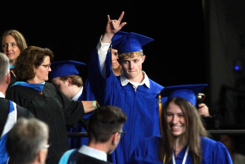 Geneva High School graduate Trevor Joseph Bean walks across the stage during the school’s commencement ceremony on Tuesday, June 3, 2025 at Northern Illinois University in DeKalb.