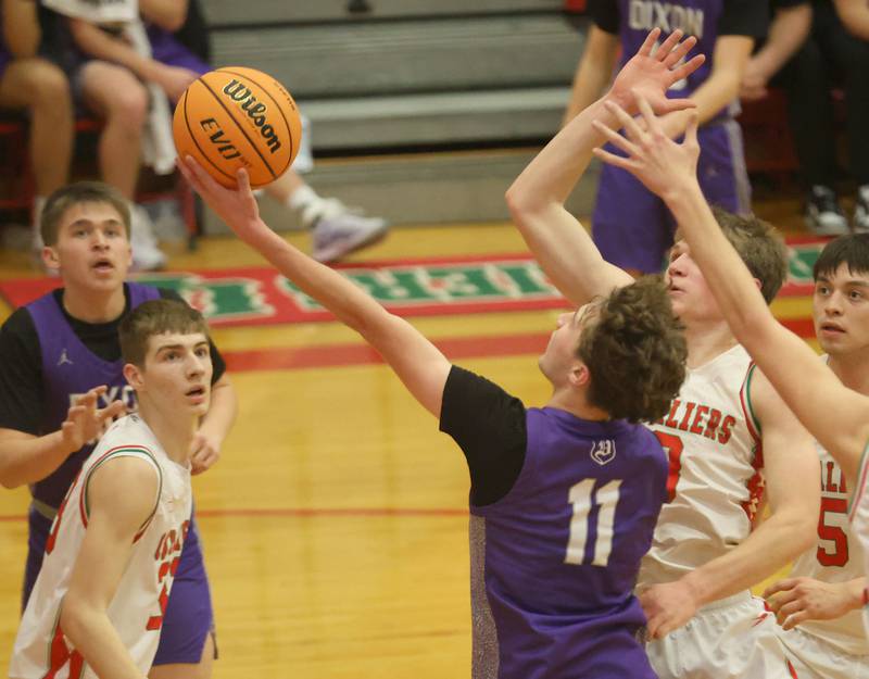 Dixon's Brody Nicklaus drives to the hoop against L-P during the Class 3A Regional semifinal game on Wednesday, Feb. 25, 2026 in Sellett Gymnasium at L-P High School.