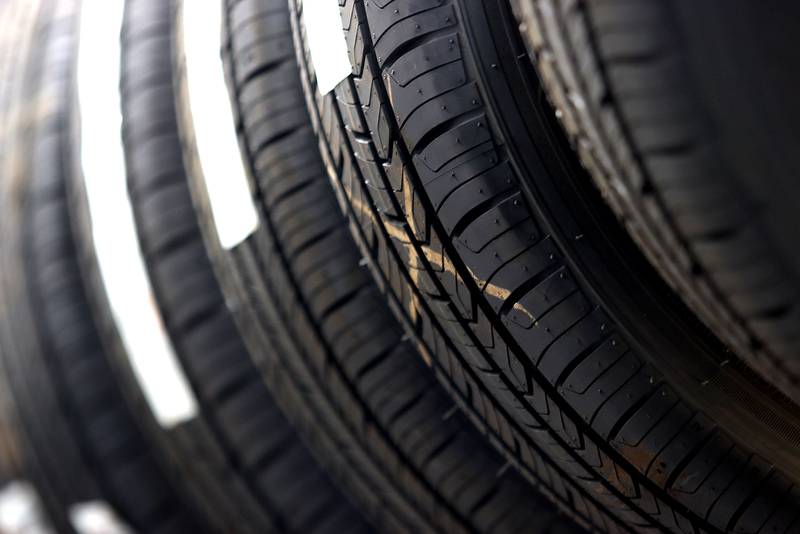 New tires are shown at Cary Tire and Auto on Thursday, Dec. 16, 2021. The local shop has experienced some of the worldwide supply chain delays which have impacted the cost and availability on some replacement vehicle parts.
