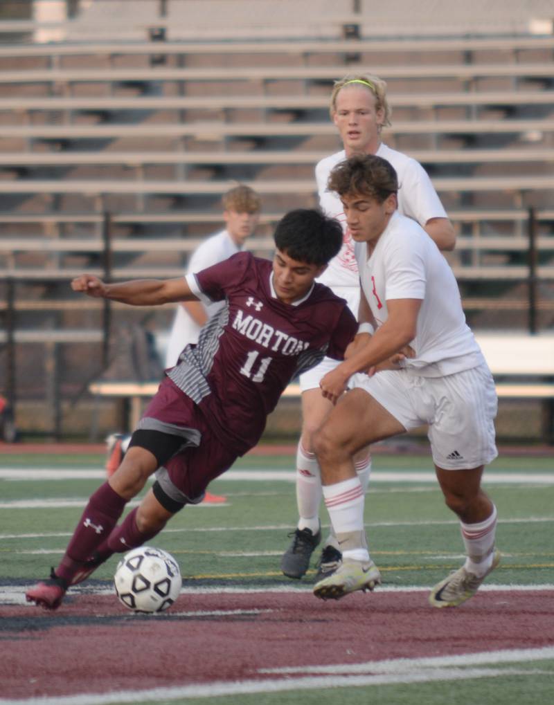 Morton West's Alexis Meza Dominguez defends the ball against Naperville Central during their home game in Berwyn Monday, Aug. 21, 2023.