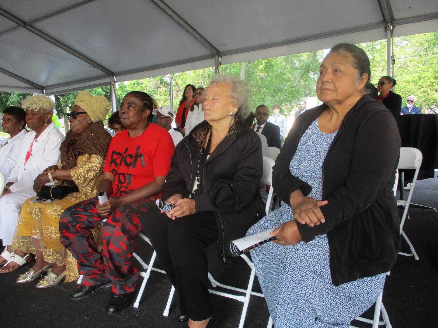 Residents at Stevenson Crossing in Joliet listen to remarks during a ribbon-cutting ceremony on Thursday, June 5, 2025.Bob