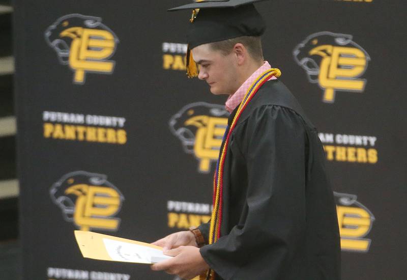 Putnam County High School graduate Jacob Edens receives his American Legion award during the 59th annual Commencement on Sunday, May 18, 2025 in R.M. Germano gymnasium.