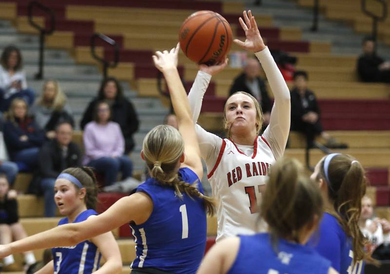 Huntley's Anna Campanelli shoots the ball over Burlington Central's Kenzie Andersen during a Fox Valley Conference girls basketball game Friday, Feb.2, 2024, at Huntley High School.