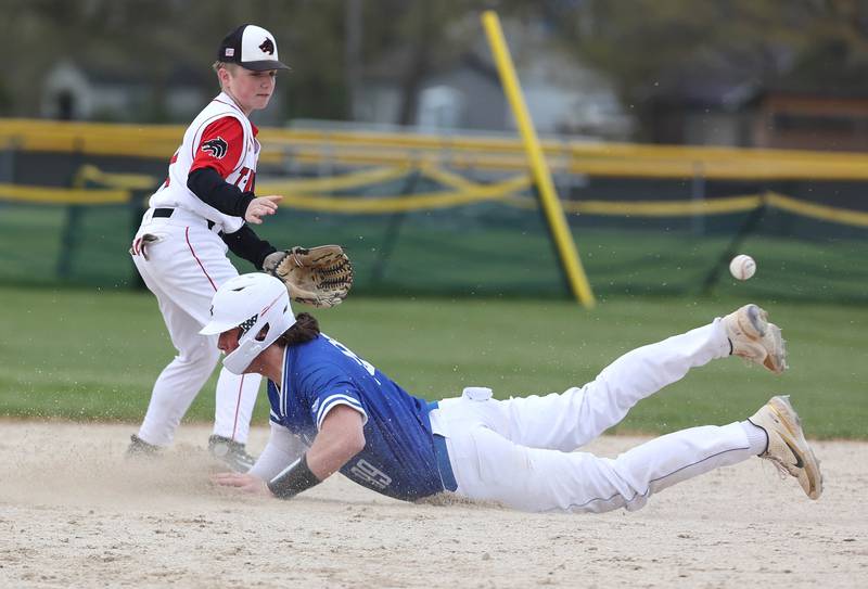 Hinckley-Big Rock's Martin Ledbetter steals second as Indian Creek's Noah Fenske takes the throw during their game Monday, May 1, 2023, at Indian Creek High School in Shabbona.