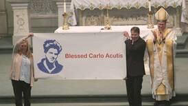 Photos: Bishop Louis Tylka gives Mass in La Salle to students/renames school