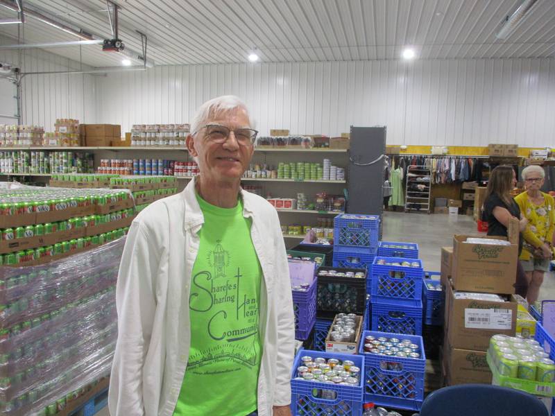 Sharefest founder Gary Cheney enjoys a moment at the nonprofit's free grocery store in New Lenox after a ribbon-cutting ceremony. May 14, 2024
