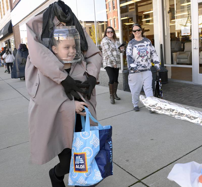It was easy to lose one’s head in all the excitement Saturday, Oct. 26, 2024, during the annual downtown trick or treat in Streator. Ghouls and goblins roamed the city receiving treats from downtown merchants.